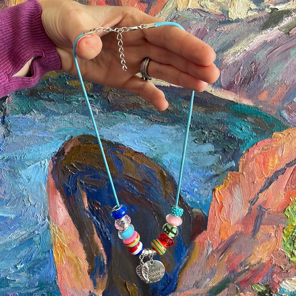 NWOT super cute necklace with glass beads and charms